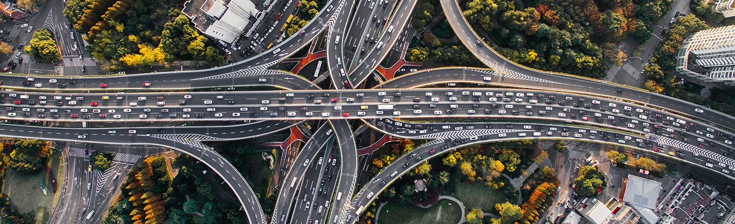 Aerial view of a highway interchange, illustrating BRE's infrastructure project certification.