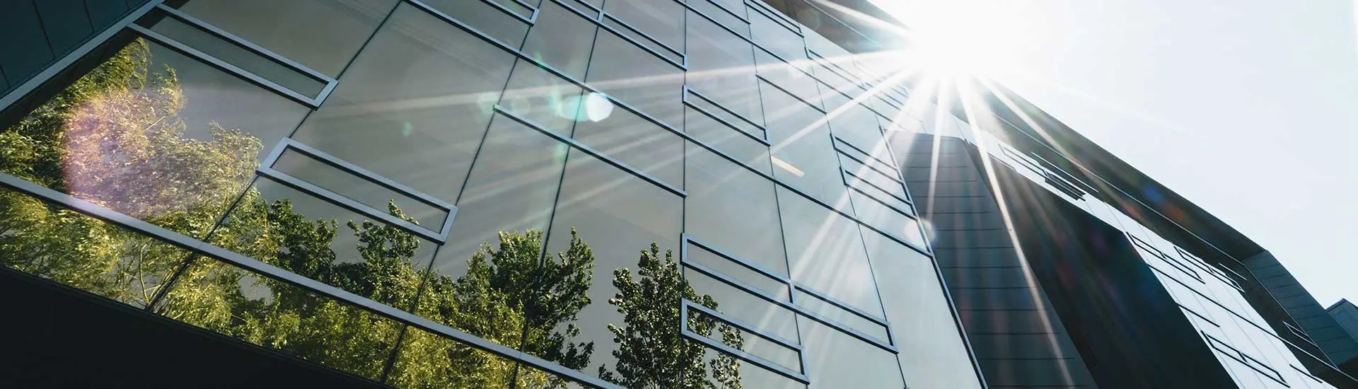 Glass building facade with sun glare, for fire safety testing by BRE.
