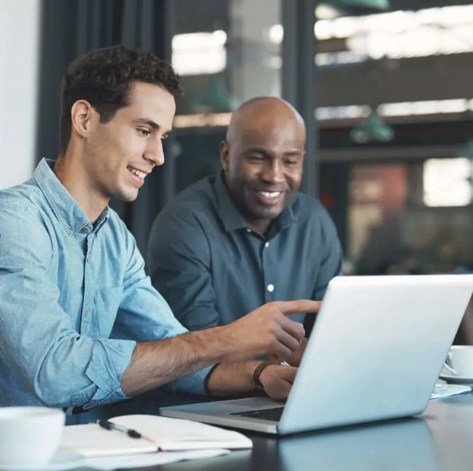people in front of a computer